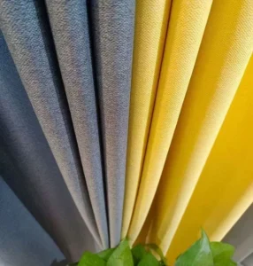 extured curtain fabric installed yellow grey room