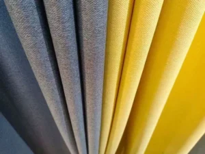 extured curtain fabric installed yellow grey room