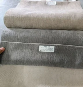 Close-up of 1400gsm heavyweight double-sided chenille curtain fabric, ideal for premium hotel drapery