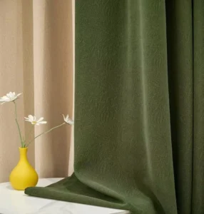 Elegant green floral chenille blackout fabric supplied directly from China factory, featuring soft and thick touch for luxury homes.